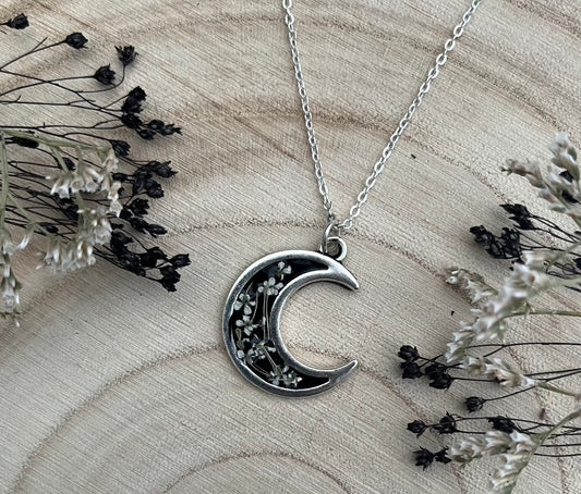 Black Crescent Moon Pendant, filled with flowers