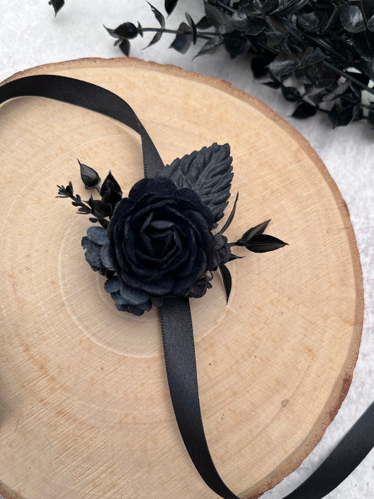 Black flower wrist corsage - for weddings and proms.